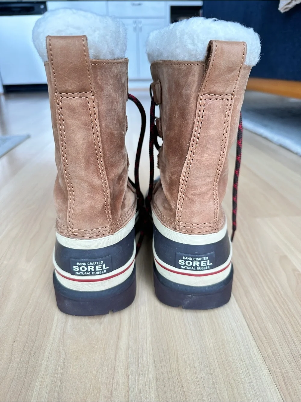 Sorel Tan and Black Waterproof Winter Boot with Red-Accent Laces